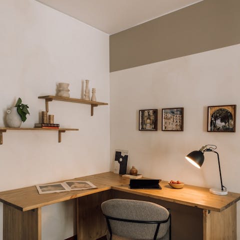 Set your workstation up at the corner desk in the bedroom