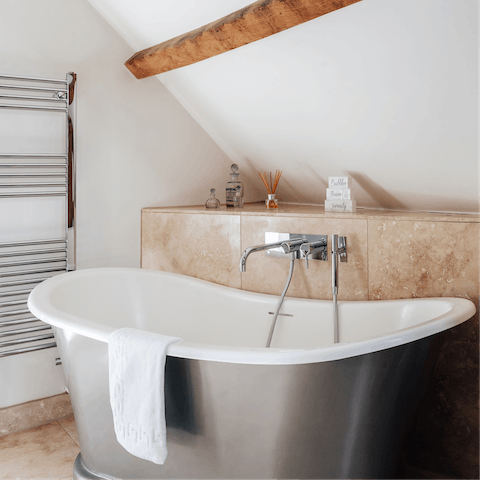 Take a luxurious soak in the roll top bath 