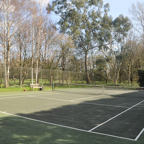 Practise your serve on the private tennis court
