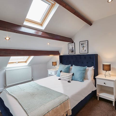 Dream well in the comfortable bedroom after a busy day exploring