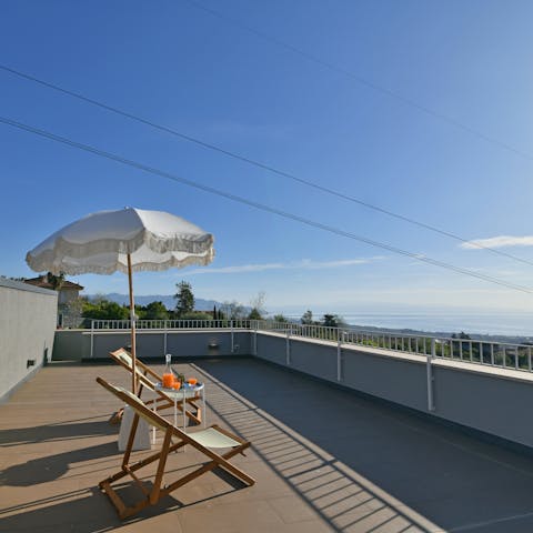 Appreciate the sea views from the balcony's sun loungers