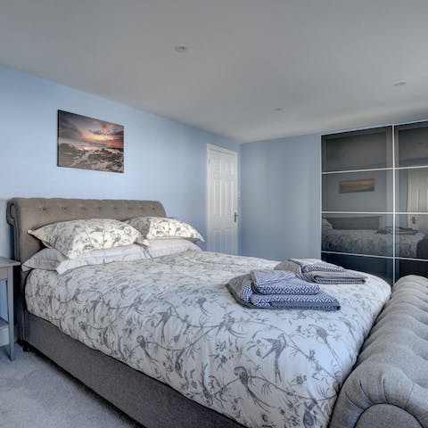 Enjoy the calming blue and grey tones throughout the home