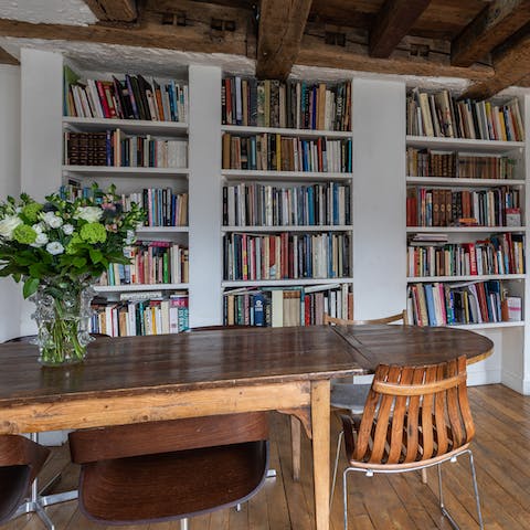 Pick a novel from your host's extensive library on a rainy afternoon