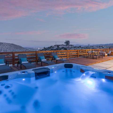 Soak in the luxurious hot tub while admiring the breathtaking vistas 