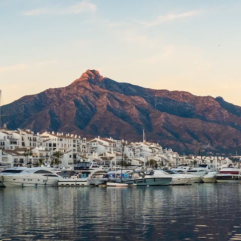Enjoy leisurely strolls along Marbella's glamorous shoreline