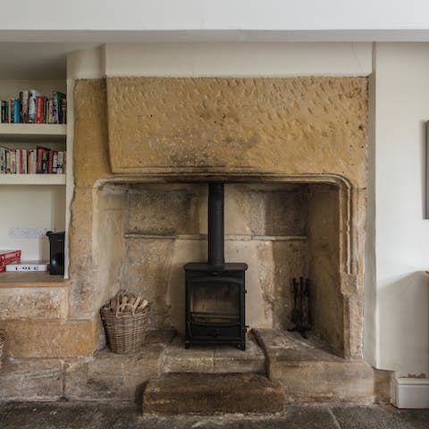 Light up the wood-burning stove in the huge stone fireplace 