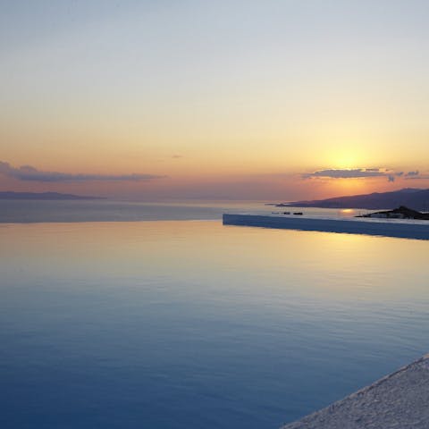 Watch the sunset as you float about in the infinity pool