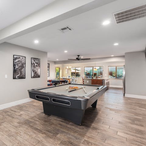 Start a pool tourmnament on the full-size table indoors