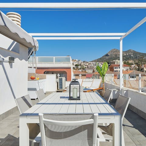 Enjoy an Andalusian feast at your rooftop terrace dining table