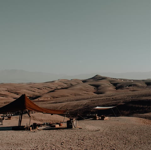 Explore the Mars-like landscapes of the Agafay Desert, a short drive outside the city