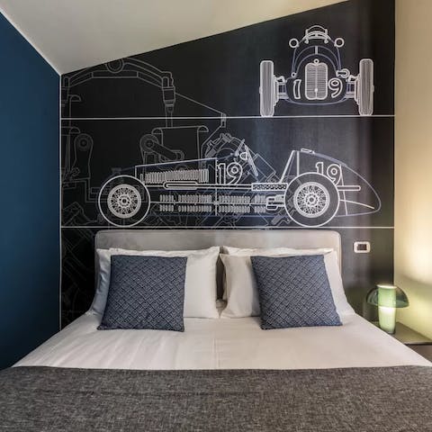 Drift off to sleep underneath the race car-inspired wallpaper 