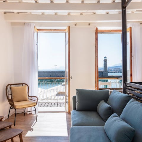 Throw open the balcony doors and unwind in the bright living area