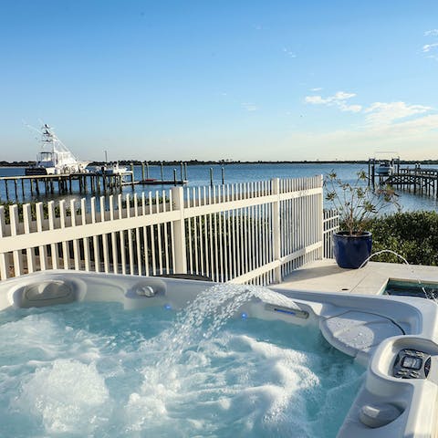 Take a seat in the hot tub just in time for the sun to start setting