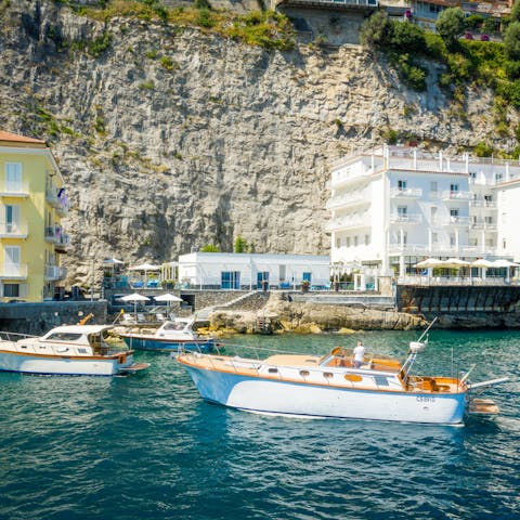 Hop on a boat to cruise along the Amalfi Coast – you'll have your own dock here