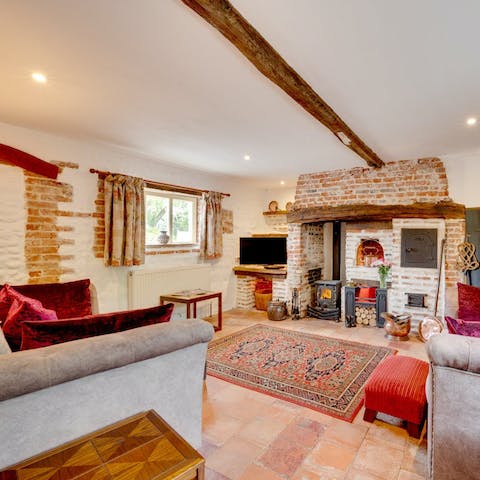 Curl up by the living room's fire on cooler evenings