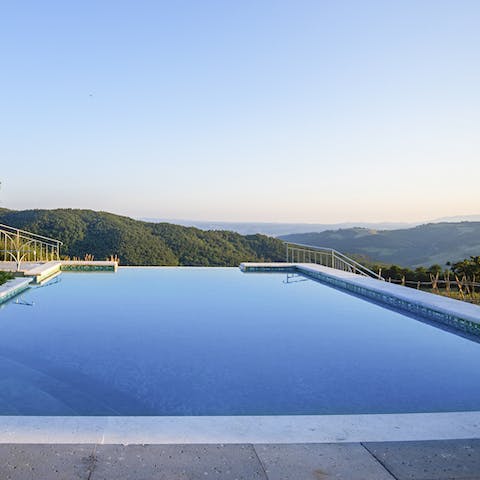 Take in Tuscan views from the pool