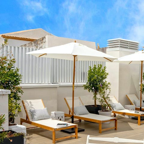 Bask in the Seville sun on the communal roof terrace