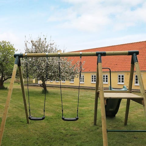 Relax with a glass of wine while the children are kept entertained for hours on the swing and slide set