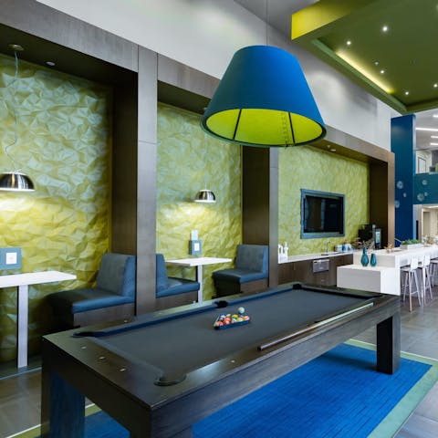 Play a game of billiards in the guest lounge