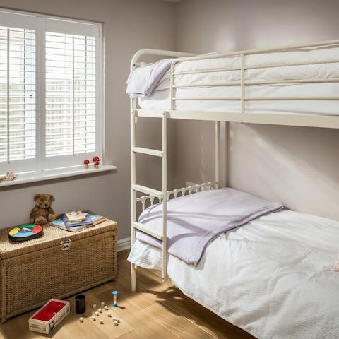 Give the kids a room of their own with bunks and games