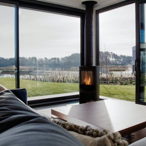 Admire the views while relaxing by the fire