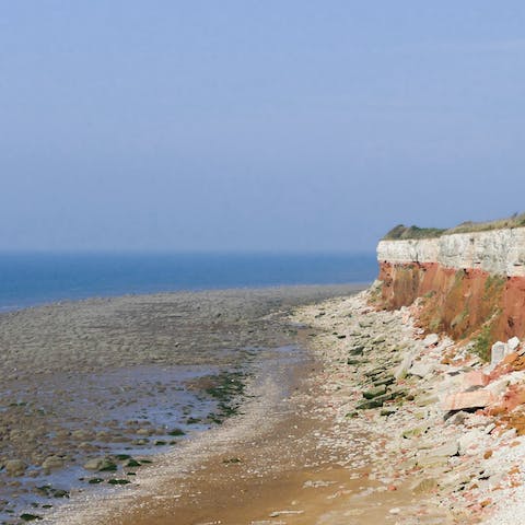 Take afternoon strolls along Hunstanton cliffs before popping into a country pub