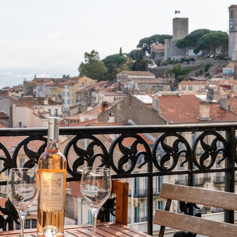 Enjoy a glass of local Provence rosé on the balcony overlooking the Suquet