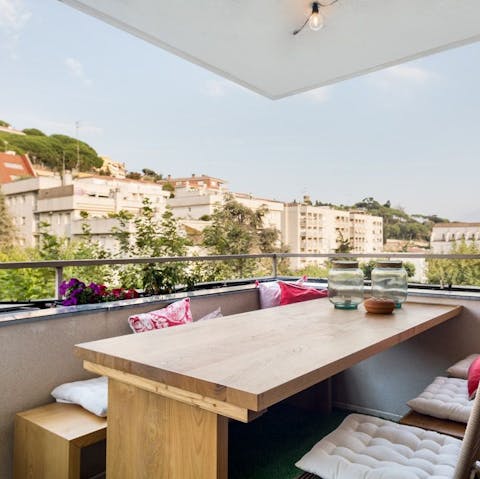 Dine alfresco with a view on the furnished terrace