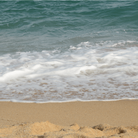 Explore Caldetas and its beautiful sand beaches, a short drive away