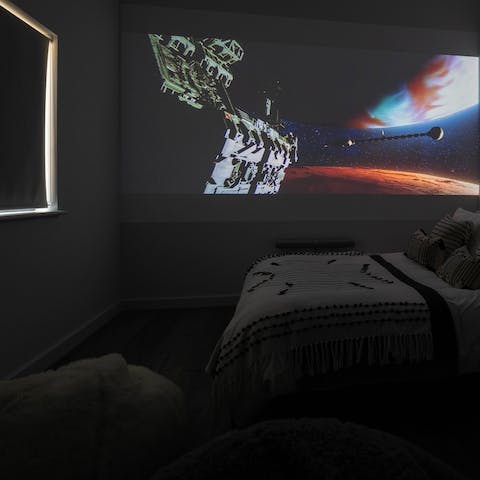 Hunker down for film nights – there’s a cinema projector with Netflix, Airplay and a collection of films at the ready