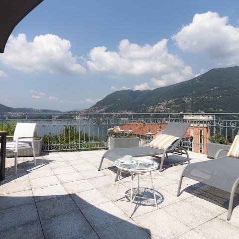 Admire the sweeping views of Lake Como on your own veranda terrace