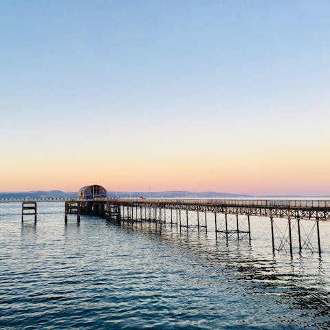 Wander down the Victorian Mumbles Pier, only a walk away