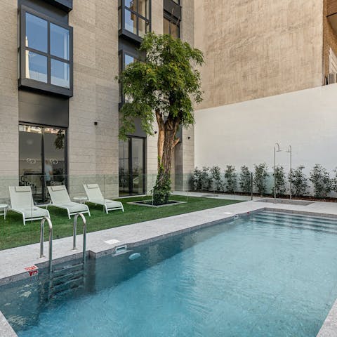 Cool off from the Madrid heat with a swim in the shared pool