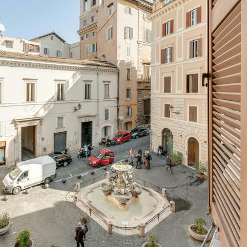 Stay overlooking the picturesque Piazza Mattei, the gateway to Rome's Jewish Quarter