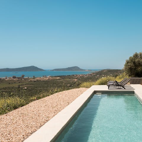Take in the magnificent Peloponnese view from the infinity pool