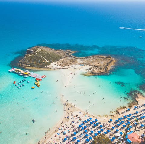 Drive fifteen minutes to Ayia Napa and relax on the buzzing beaches