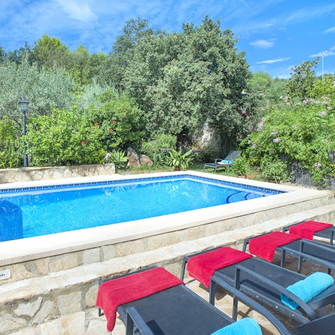 Soak up the sun then dive into the cooling waters of the pool