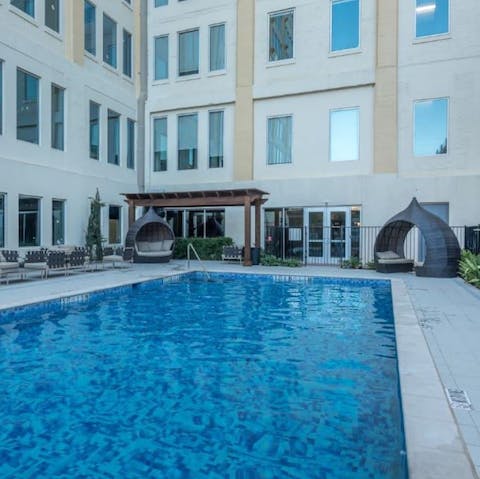 Jump into the communal pool to cool off from the Texas heat