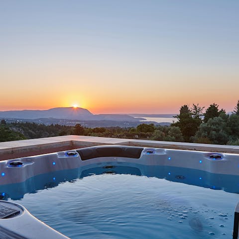 Bask in the glow of the sunset from your private hot tub