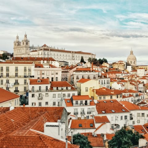 Gaze out over rooftops, and take in ocean vistas and scenic sunsets from the grounds of Castelo de São Jorge – just a short walk away