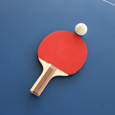 Challenge your loved ones to a table tennis tournament in the games room