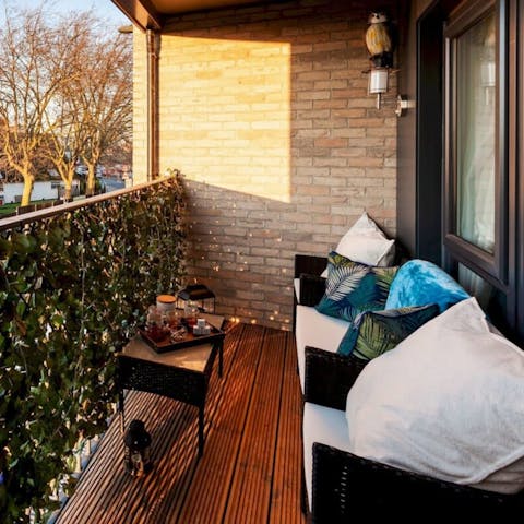 Start your mornings with a cup of coffee on your private balcony