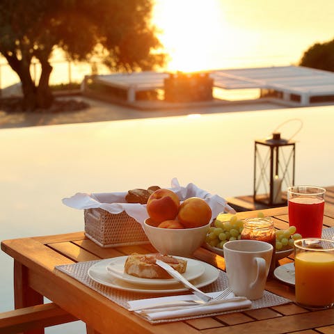 Watch the sunrise over the sea at breakfast
