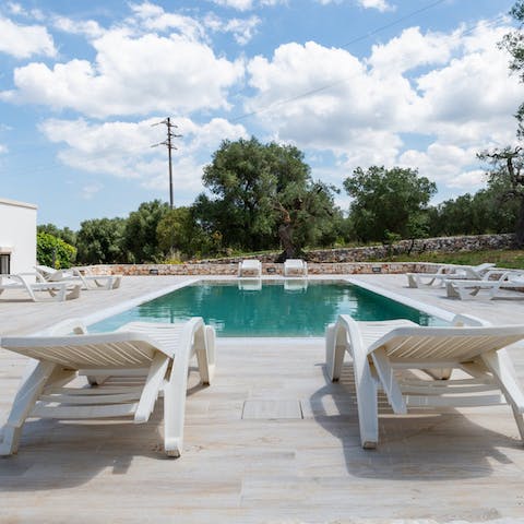 Lie back by the pool after a morning swim and let the sun dry you off