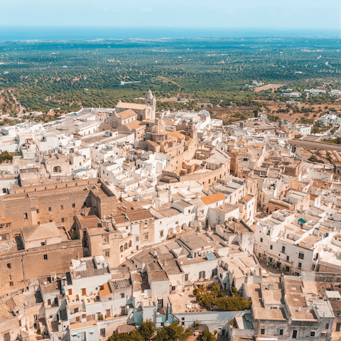 Stroll right into the centre of Ostuni and visit the famous white painted old town