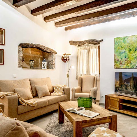 Unwind amid the old-world features of the home, like stone alcoves and wood beams