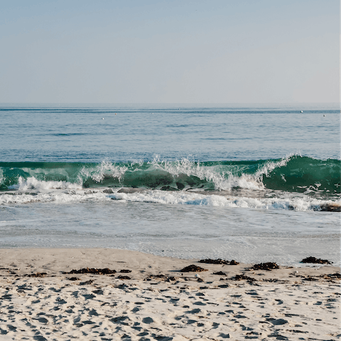 Drive thirteen minutes to the sandy stretch of the Grande Plage