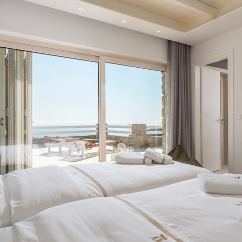 Wake up to the stunning views of the Aegean Sea