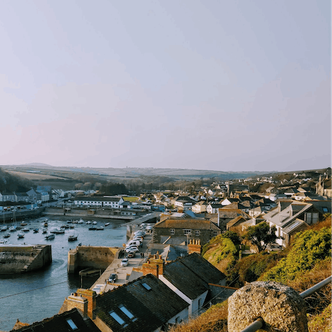 Tuck into a portion of fish and chips at Porthleven Harbour, a five-minute walk from home