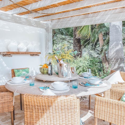 Enjoy a celebratory meal by dining alfresco on the covered terrace